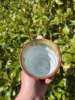 White and brown stain mug